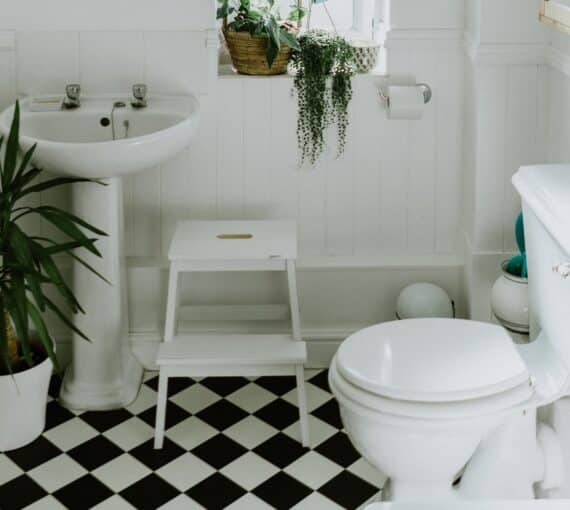 bathroom-toilet-sink A sink and toilet in a bathroom