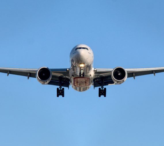 Airplane at mid air at daytime