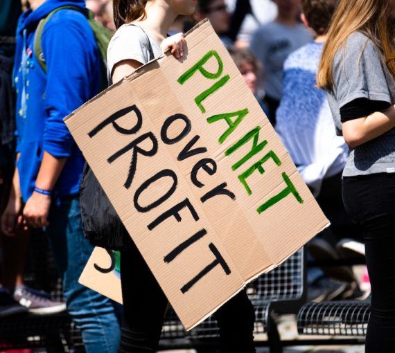 demonstrator holding sign